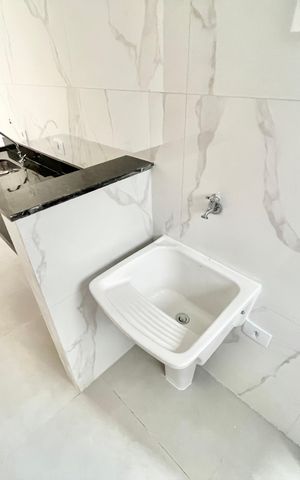 Apartamento à venda com 48m², 2 quartos e sem vaga Apartamento à venda com 48m², 2 quartos e sem vagaCozinha e Área de Serviço