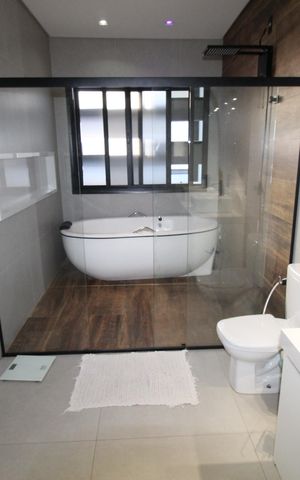 Casa de condomínio para alugar com 376m², 5 quartos e 4 vagasBanheiro da Suíte 2