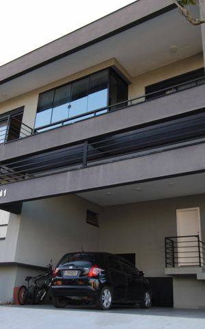 Casa de condomínio para alugar com 376m², 5 quartos e 4 vagasFachada