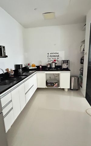 Casa de condomínio para alugar com 197m², 3 quartos e 4 vagasCozinha