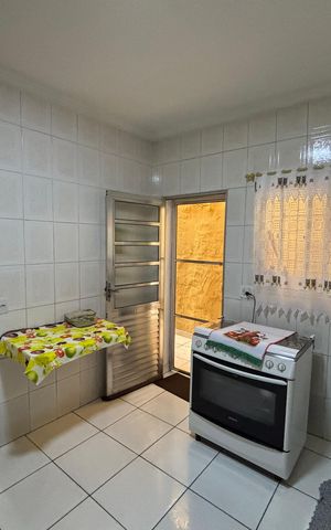 Casa à venda com 135m², 2 quartos e 3 vagas Casa à venda com 135m², 2 quartos e 3 vagasCozinha - Armários