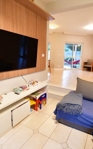 Casa de condomínio à venda com 280m², 4 quartos e 4 vagasSala