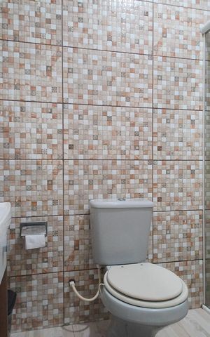 Casa à venda com 91m², 3 quartos e 2 vagasBanheiro