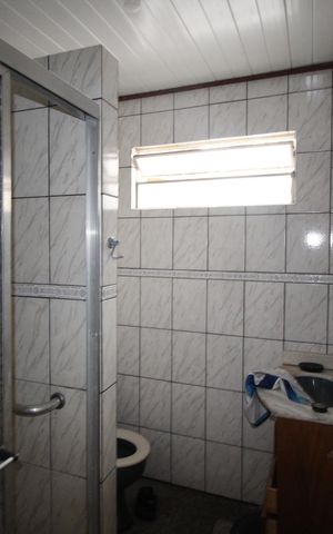 Casa à venda com 200m², 4 quartos e 4 vagasBanheiro