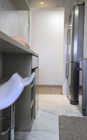 Apartamento à venda com 51m², 2 quartos e 1 vaga Apartamento à venda com 51m², 2 quartos e 1 vagaCozinha e Área de Serviço