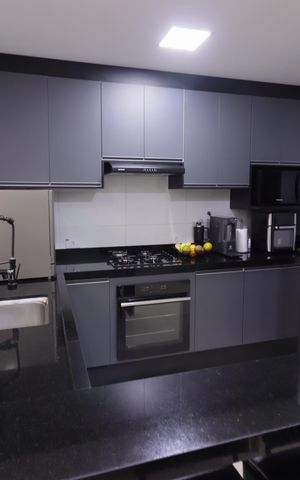 Casa à venda com 96m², 2 quartos e 2 vagasSala/Cozinha