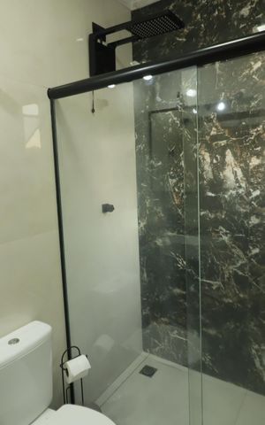 Casa à venda com 96m², 2 quartos e 2 vagasBanheiro da Suíte 1