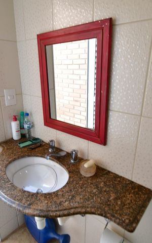 Casa à venda com 310m², 4 quartos e 4 vagasBanheiro de serviço