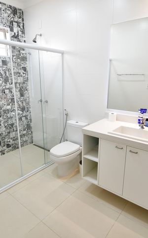 Casa à venda com 310m², 4 quartos e 4 vagasBanheiro Suíte