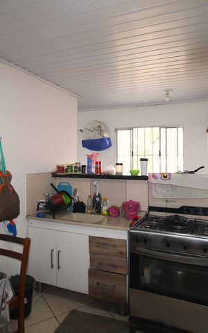 Casa à venda com 115m², 3 quartos e sem vagaSala/Cozinha