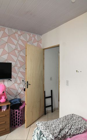 Casa à venda com 115m², 3 quartos e sem vagaQuarto 1