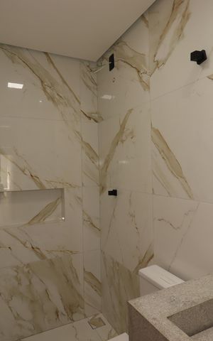 Casa à venda com 125m², 3 quartos e 2 vagasBanheiro da Suíte