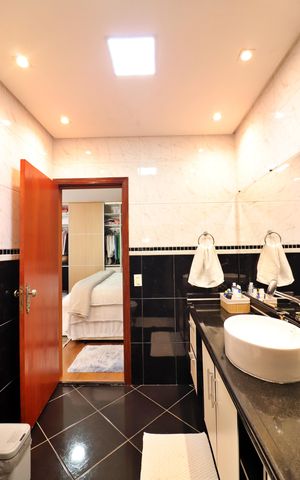 Casa à venda com 450m², 4 quartos e 2 vagasQuarto 3 - Suíte Banheiro 