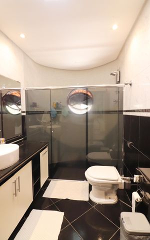 Casa à venda com 450m², 4 quartos e 2 vagasQuarto 3 - Suíte Banheiro 