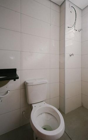Casa à venda com 41m², 2 quartos e sem vaga Casa à venda com 41m², 2 quartos e sem vagaBanheiro