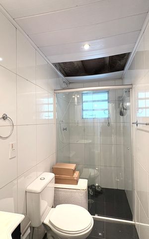 Casa à venda com 355m², 3 quartos e 4 vagas Casa à venda com 355m², 3 quartos e 4 vagasBanheiro da Suíte