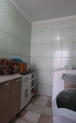 Casa à venda com 177m², 3 quartos e 2 vagasLavanderia