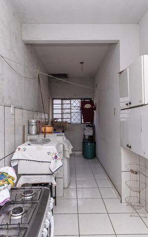 Casa à venda com 85m², 3 quartos e 1 vaga Casa à venda com 85m², 3 quartos e 1 vagaCozinha e Área de Serviço