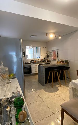 Casa para alugar com 104m², 2 quartos e 2 vagasCozinha