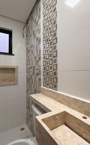 Casa à venda com 110m², 2 quartos e 2 vagas Casa à venda com 110m², 2 quartos e 2 vagasBanheiro da Suíte 1