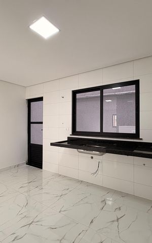 Casa à venda com 110m², 2 quartos e 2 vagas Casa à venda com 110m², 2 quartos e 2 vagasCozinha