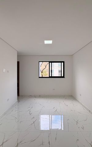 Casa à venda com 110m², 2 quartos e 2 vagas Casa à venda com 110m², 2 quartos e 2 vagasSala