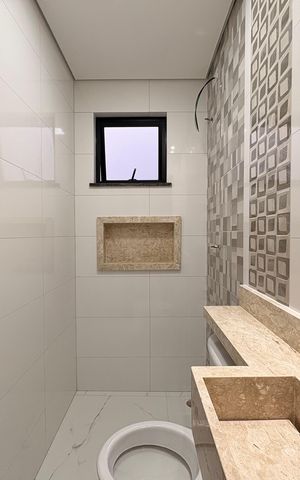 Casa à venda com 110m², 2 quartos e 2 vagas Casa à venda com 110m², 2 quartos e 2 vagasBanheiro da Suíte 1