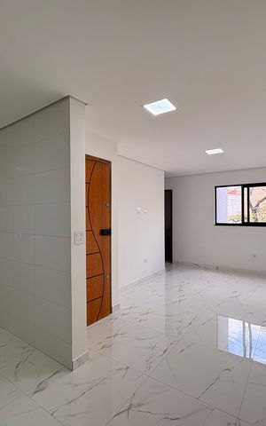 Casa à venda com 110m², 2 quartos e 2 vagas Casa à venda com 110m², 2 quartos e 2 vagasSala