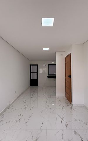 Casa à venda com 110m², 2 quartos e 2 vagas Casa à venda com 110m², 2 quartos e 2 vagasSala