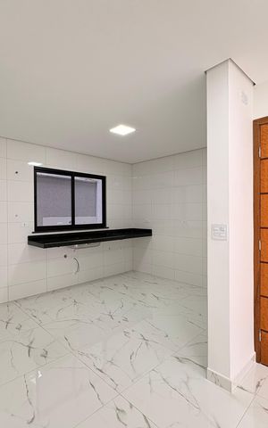 Casa à venda com 110m², 2 quartos e 2 vagas Casa à venda com 110m², 2 quartos e 2 vagasCozinha