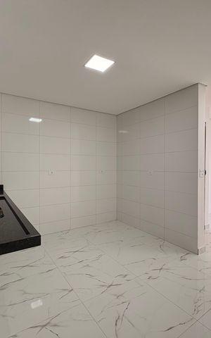 Casa à venda com 110m², 2 quartos e 2 vagas Casa à venda com 110m², 2 quartos e 2 vagasCozinha