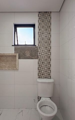 Casa à venda com 110m², 2 quartos e 2 vagas Casa à venda com 110m², 2 quartos e 2 vagasBanheiro da Suíte 2