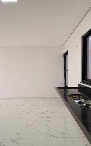 Casa à venda com 110m², 2 quartos e 2 vagas Casa à venda com 110m², 2 quartos e 2 vagasCozinha