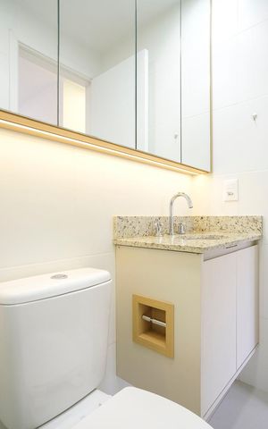 Apartamento à venda com 63m², 2 quartos e 2 vagasBanheiro da suíte