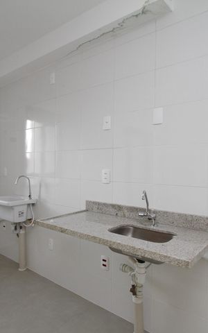 Apartamento à venda com 59m², 2 quartos e 1 vagaCozinha e Área de Serviço
