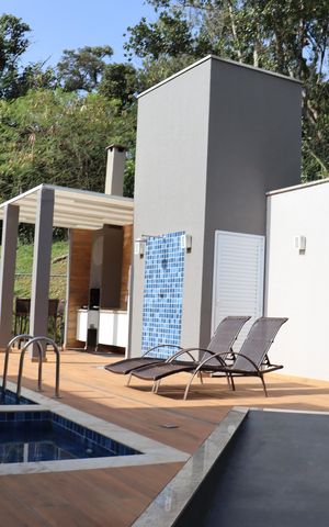 Casa de condomínio à venda com 112m², 3 quartos e 2 vagas Casa de condomínio à venda com 112m², 3 quartos e 2 vagasÁrea comum - Churrasqueira