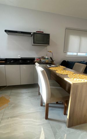 Casa de condomínio à venda com 112m², 3 quartos e 2 vagas Casa de condomínio à venda com 112m², 3 quartos e 2 vagasCozinha