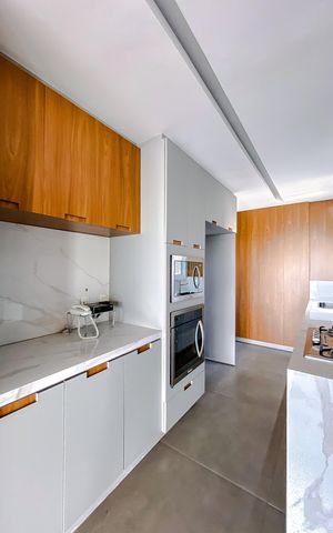 Apartamento à venda com 134m², 2 quartos e 2 vagas Apartamento à venda com 134m², 2 quartos e 2 vagasCozinha e Área de Serviço