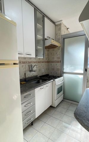 Apartamento à venda com 60m², 3 quartos e 1 vaga Apartamento à venda com 60m², 3 quartos e 1 vagaCozinha e Área de Serviço