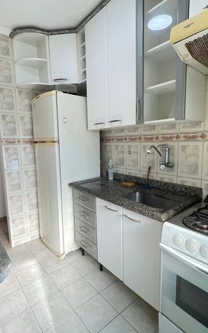Apartamento à venda com 60m², 3 quartos e 1 vaga Apartamento à venda com 60m², 3 quartos e 1 vagaCozinha e Área de Serviço