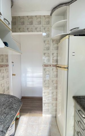 Apartamento à venda com 60m², 3 quartos e 1 vaga Apartamento à venda com 60m², 3 quartos e 1 vagaCozinha e Área de Serviço
