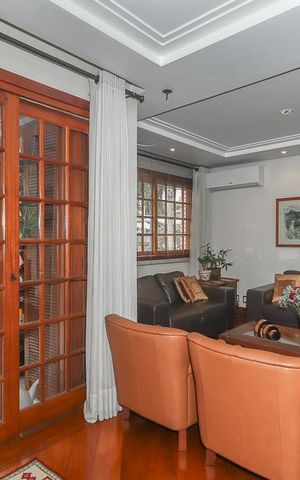 Casa de condomínio à venda com 234m², 3 quartos e 2 vagasSala