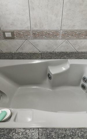 Casa de condomínio à venda com 234m², 3 quartos e 2 vagasBanheiro da Suíte