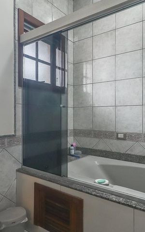 Casa de condomínio à venda com 234m², 3 quartos e 2 vagasBanheiro da Suíte