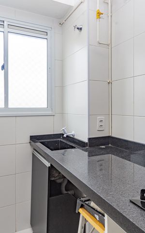 Apartamento à venda com 40m², 2 quartos e sem vaga Apartamento à venda com 40m², 2 quartos e sem vagaCozinha e Área de Serviço