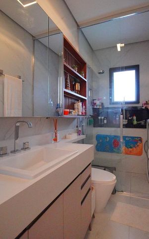 Casa de condomínio para alugar com 260m², 4 quartos e 2 vagasBanheiro da Suíte 3
