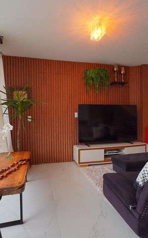 Casa de condomínio para alugar com 260m², 4 quartos e 2 vagasSala