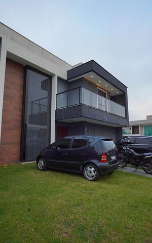 Casa de condomínio para alugar com 260m², 4 quartos e 2 vagasGaragem