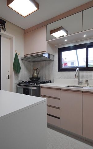 Casa de condomínio para alugar com 260m², 4 quartos e 2 vagasCozinha