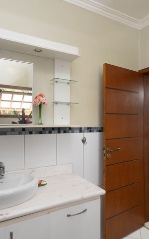 Casa à venda com 1000m², 4 quartos e 10 vagas Casa à venda com 1000m², 4 quartos e 10 vagasBanheiro da Suíte 3